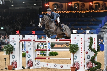 Ben Maher claims the Champagne-Taittinger Ivy Stakes from the front with Ginger-Blue at the London International Horse Show Ben Maher claims the Champagne-Taittinger Ivy Stakes from the front with Ginger-Blue at the London International Horse Show